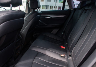 Подержанный автомобиль BMW X6 2015 года (13 фото)