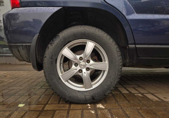 Подержанный автомобиль Kia Sportage 2010 года (13 фото)