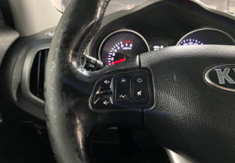 Подержанный автомобиль Kia Sportage 2015 года (14 фото)