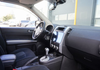 Подержанный автомобиль Nissan X-Trail 2013 года (11 фото)