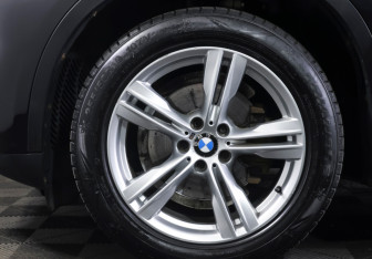 Подержанный автомобиль BMW X5 2014 года (20 фото)