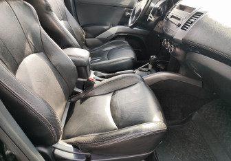 Подержанный автомобиль Mitsubishi Outlander 2011 года (9 фото)