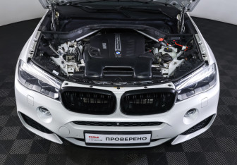 Подержанный автомобиль BMW X6 2016 года (9 фото)
