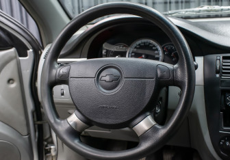 Подержанный автомобиль Chevrolet Lacetti Sedan 2009 года (14 фото)