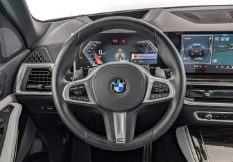 Подержанный автомобиль BMW X5 2025 года (21 фото)