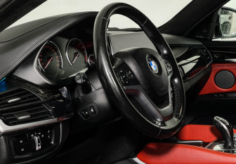 Подержанный автомобиль BMW X6 2018 года (11 фото)