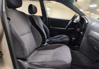 Подержанный автомобиль Kia Spectra Sedan 2007 года (13 фото)