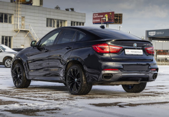 Подержанный автомобиль BMW X6 2015 года (9 фото)