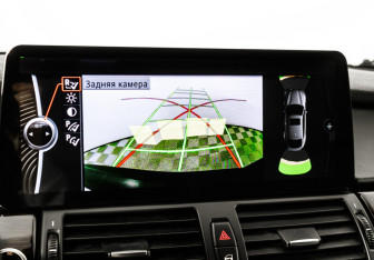 Подержанный автомобиль BMW X6 2011 года (14 фото)