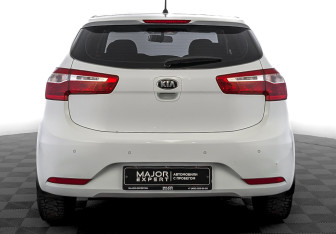 Подержанный автомобиль Kia Rio Hatchback 2014 года (6 фото)
