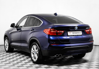 Подержанный автомобиль BMW X4 2015 года (7 фото)