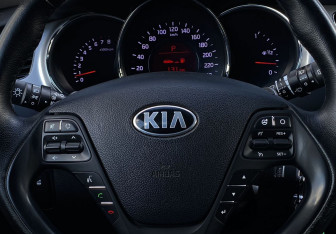 Подержанный автомобиль Kia Ceed Wagon 2014 года (14 фото)