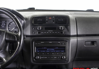 Подержанный автомобиль Skoda Fabia Hatchback 2010 года (14 фото)