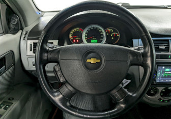 Подержанный автомобиль Chevrolet Lacetti Sedan 2012 года (24 фото)