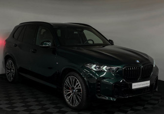 Подержанный автомобиль BMW X5 2024 года (33 фото)
