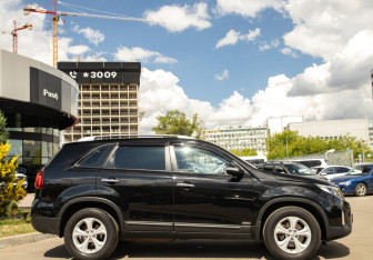 Подержанный автомобиль Kia Sorento 2013 года (3 фото)