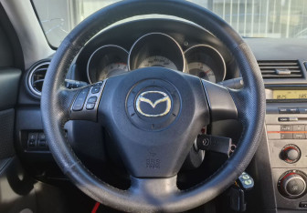Подержанный автомобиль Mazda 3 Sedan 2007 года (13 фото)