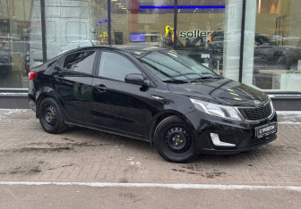 Подержанный автомобиль Kia Rio Sedan 2014 года (3 фото)