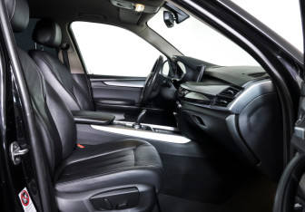 Подержанный автомобиль BMW X5 2014 года (11 фото)