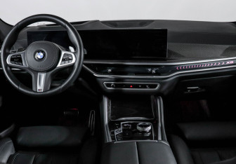 Подержанный автомобиль BMW X6 2025 года (12 фото)
