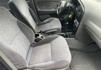Подержанный автомобиль Kia Spectra Sedan 2006 года (9 фото)