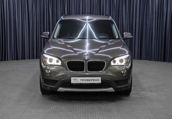Подержанный автомобиль BMW X1 2013 года (2 фото)