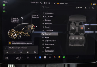 Подержанный автомобиль Tesla Model 3 2021 года (16 фото)