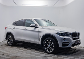 Подержанный автомобиль BMW X6 2015 года (7 фото)