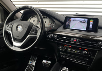 Подержанный автомобиль BMW X6 2016 года (13 фото)