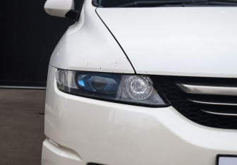 Подержанный автомобиль Honda Odyssey Compactvan 2004 года (19 фото)