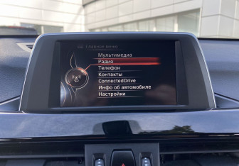 Подержанный автомобиль BMW X1 2016 года (15 фото)