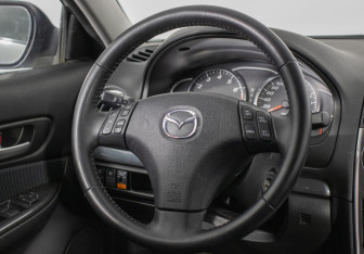 Подержанный автомобиль Mazda 6 Liftback 2006 года (15 фото)