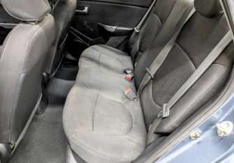 Подержанный автомобиль Kia Rio Sedan 2016 года (12 фото)