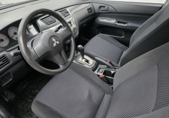 Подержанный автомобиль Mitsubishi Lancer Sedan 2009 года (9 фото)
