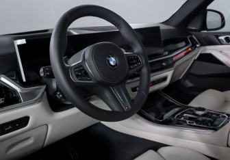 Подержанный автомобиль BMW X5 2025 года (14 фото)