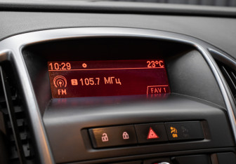 Подержанный автомобиль Opel Astra Hatchback 2013 года (19 фото)