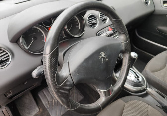 Подержанный автомобиль Peugeot 308 Hatchback 2013 года (13 фото)
