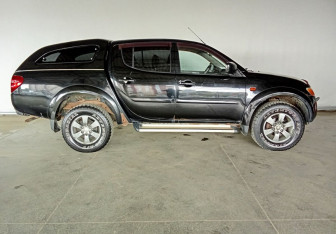 Подержанный автомобиль Mitsubishi L200 2008 года (8 фото)