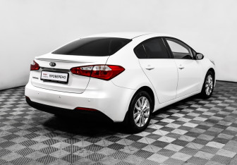 Подержанный автомобиль Kia Cerato Sedan 2013 года (5 фото)
