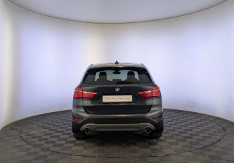 Подержанный автомобиль BMW X1 2018 года (7 фото)