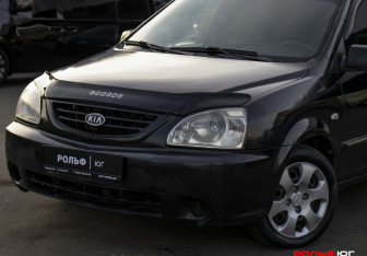 Подержанный автомобиль Kia Carens 2005 года (16 фото)