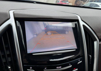 Подержанный автомобиль Cadillac SRX 2014 года (12 фото)