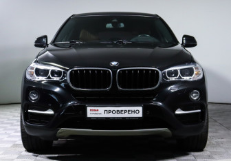 Подержанный автомобиль BMW X6 2015 года (2 фото)