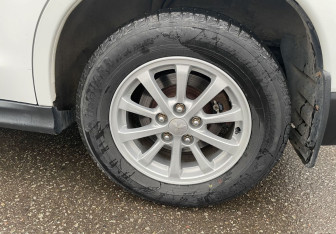 Подержанный автомобиль Mitsubishi ASX 2011 года (12 фото)