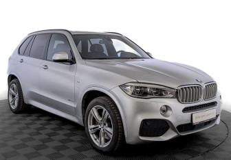 Подержанный автомобиль BMW X5 2014 года (3 фото)