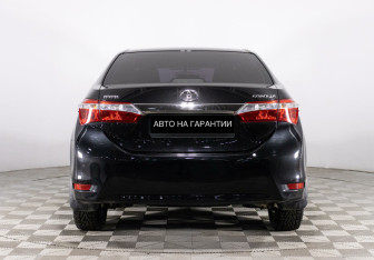 Подержанный автомобиль Toyota Corolla Sedan 2014 года (4 фото)