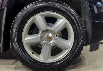 Подержанный автомобиль Chevrolet Tahoe 2013 года (23 фото)