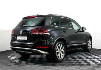 Подержанный автомобиль Volkswagen Touareg 2014 года (5 фото)