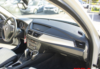 Подержанный автомобиль BMW X1 2014 года (12 фото)