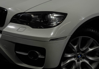 Подержанный автомобиль BMW X6 2010 года (7 фото)